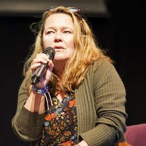 Lisa Whytock, speaking here at an event, is a client of Inner Ear's for branded content creation, live shared digital experiences and creative business development consultancy.